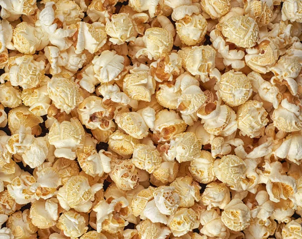 Close-up van popcorn achtergrond. Bovenaanzicht — Stockfoto