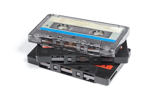 Three old audio tapes for magnetic recording isolated — Stock Photo, Image