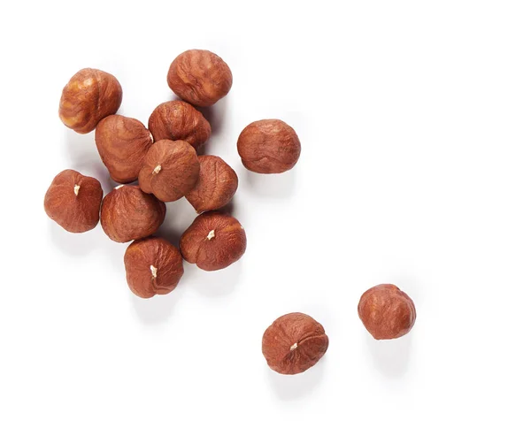 Hazelnuts isolated on white background. Top view. — Stock Photo, Image