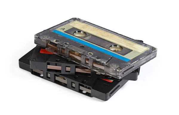 Stack of an old audio tape compact cassettes isolated — 图库照片