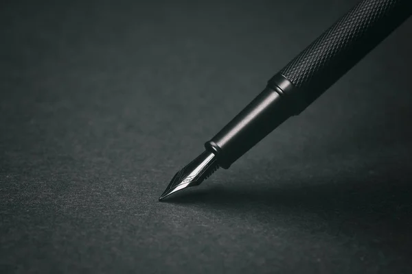 Fountain pen on black background — Stock Photo, Image