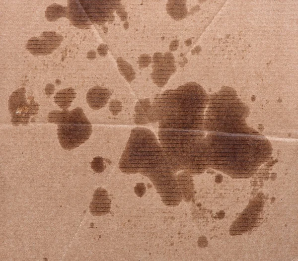 Cardboard texture spotted of grease stain — Stock Photo, Image