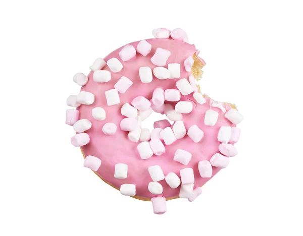 Pink glazed bitten round donut with marshmallows sprinkles isola — Stock Photo, Image