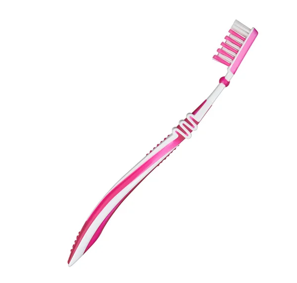 Ροζ πλαστική οδοντόβουρτσα πλευρικά απομονωμένη σε λευκό — Φωτογραφία Αρχείου