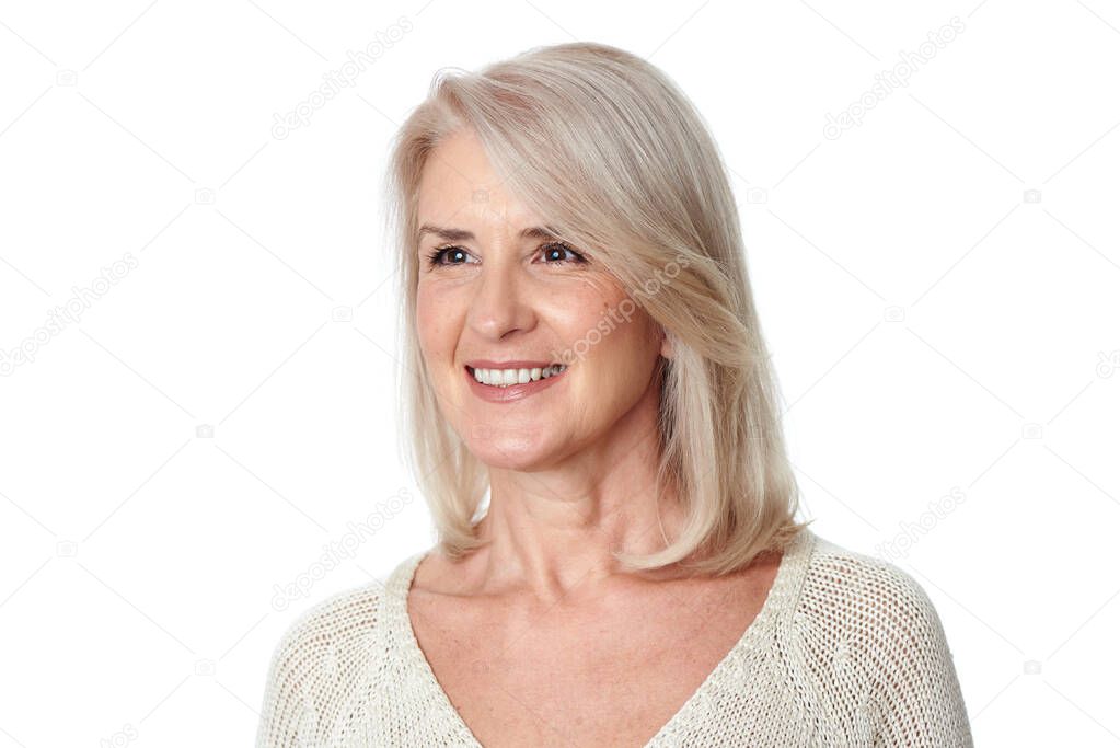 Portrait of beautiful senior woman with white hair is looking aside. Isolated