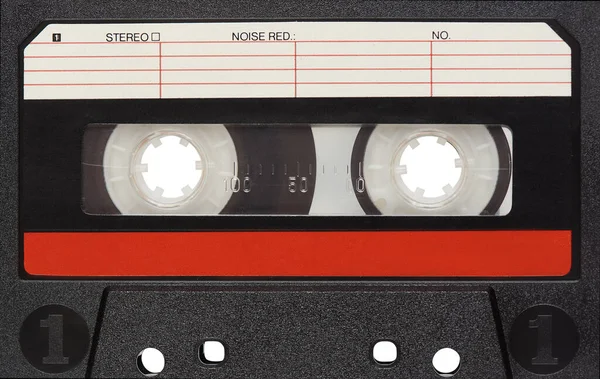 Old audio tape compact cassette with blank label close up