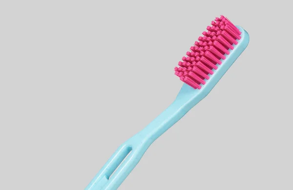 Brosse Dents Plastique Bleue Rose Isolée Latéralement Sur Fond Gris — Photo