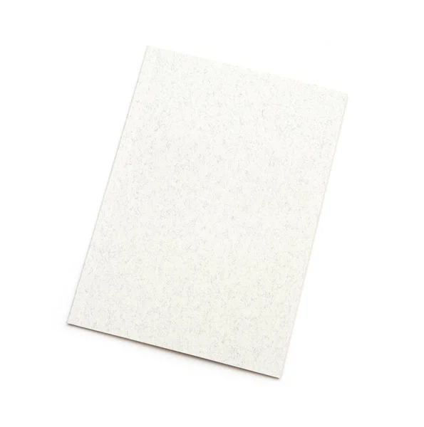 Close up de um livro branco em branco sobre fundo branco Fotos De Bancos De Imagens