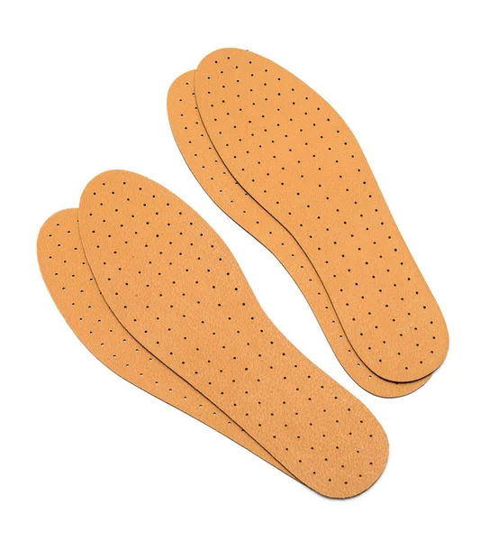 Brown insoles for shoes on a white background — Stock Photo, Image