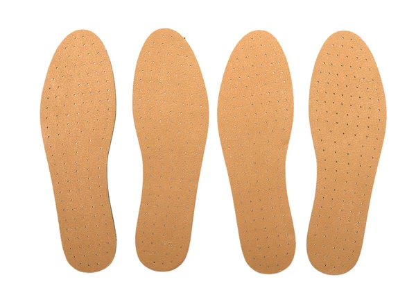 Braune Einlegesohlen für Schuhe auf weißem Hintergrund — Stockfoto