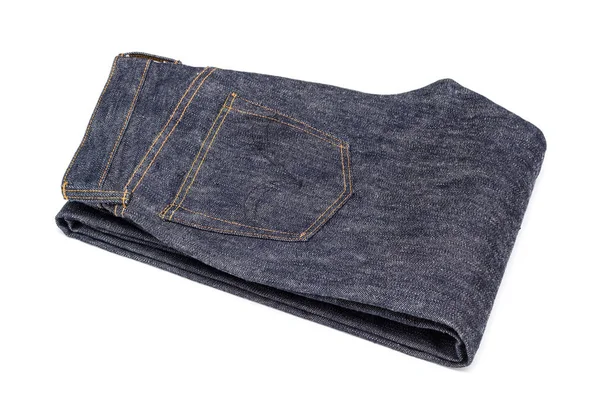 Donkerblauwe jeans op een witte achtergrond — Stockfoto