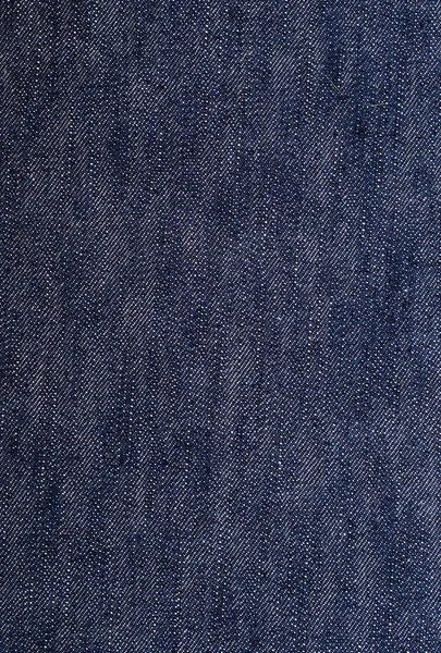 En jeans indigo bakgrund eller konsistens — Stockfoto
