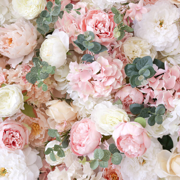 Background panel of artificial flowers peonies, roses and eucaly