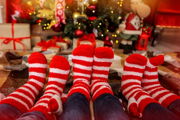 Warm socks in red and white stripes on the background of the Chr — Stock Photo, Image