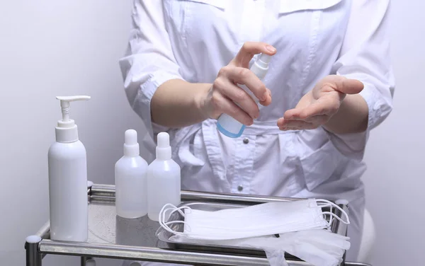 Nurse Sanitizes Hands Coronavirus Covid Quarantine Alcohol Spray Bottle Disinfectant — Stock Photo, Image