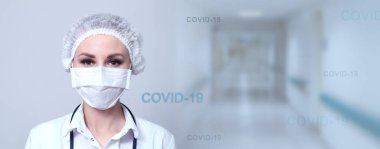 Koruyucu tıbbi maskeli bir kadın doktor. Salgın virüsü COVID-19