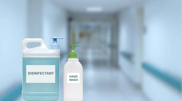 Desinfektionsmedel Behållare Suddig Bakgrund Sjukhuset Hall Pandemiskt Virus Covid — Stockfoto