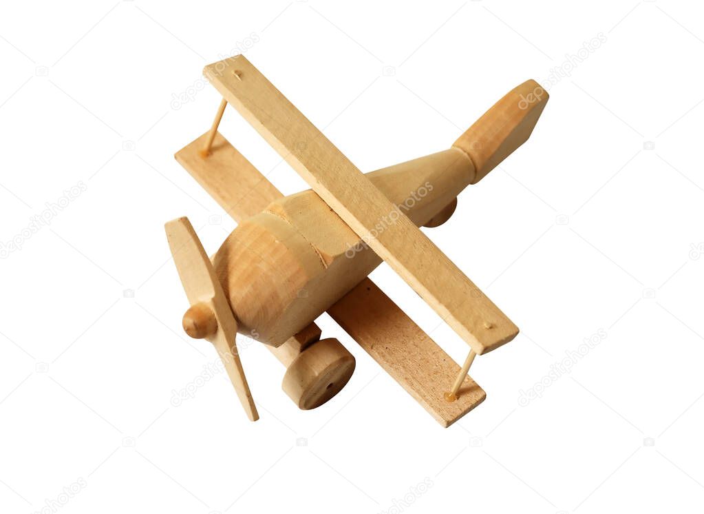 Small wooden airplane isolated on white background with clipping path