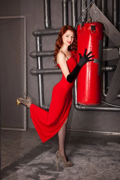 Portrait with punching bag — Stock Photo, Image