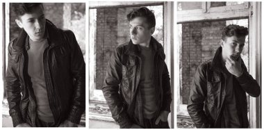 eski püskü duvar arasında bir deri ceketli bir çocuk portresi