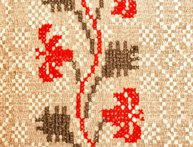 A rough fabric with national embroidery.