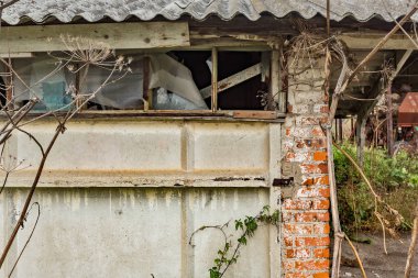 Ruined building broken glass. .Abandoned collective farm. Russia, Tula region.