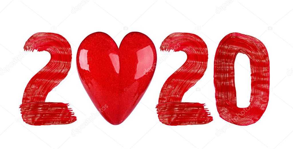 For Christmas and New Year. The inscription 2020 and the heart created from bright letters drawn by red paints. Isolated on white.