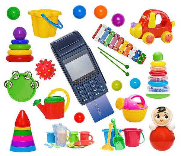 Payment for the purchase of toys by credit card with a modern blue payment terminal.