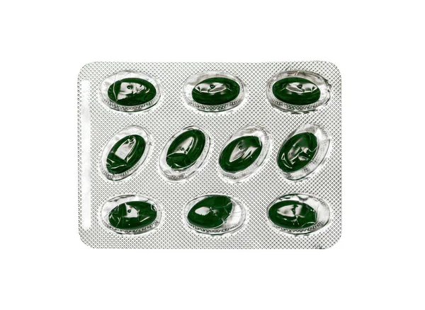 Oval Yeşil Haplar Tabletler Bir Beyazda Izole Edilmiş — Stok fotoğraf