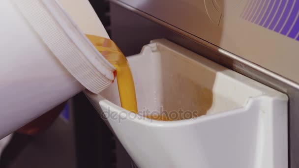 Filling freezer with fruit mix — Stock Video