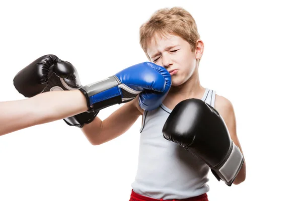 Handsome boxer child boy training boxing sport got punched — Stock Photo, Image