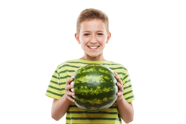 Stilig leende barn pojke holding grön vattenmelon frukt — Stockfoto