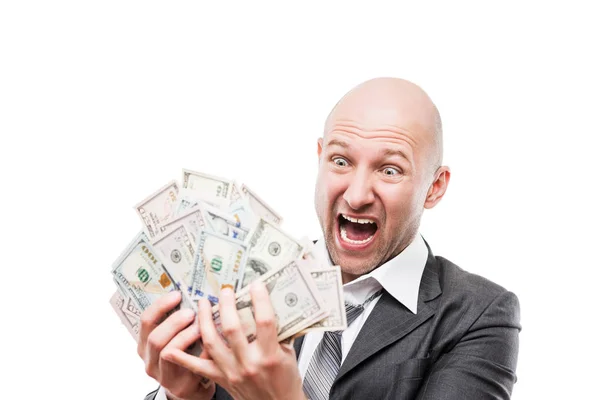 Geschäftsmann im schwarzen Anzug hält uns Dollargeld in der Hand — Stockfoto