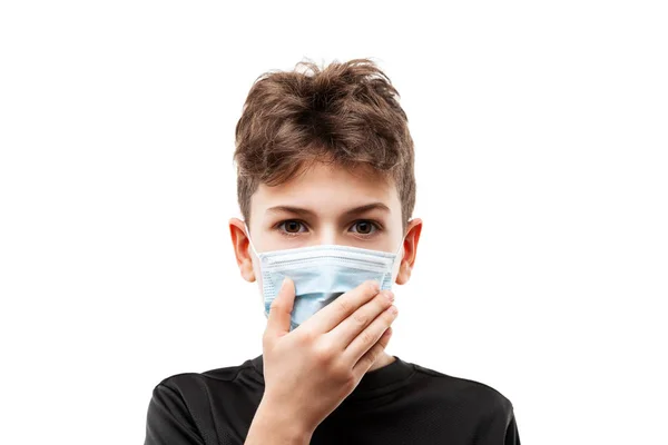 Teenager boy wearing respiratory protective medical mask Royalty Free Stock Images