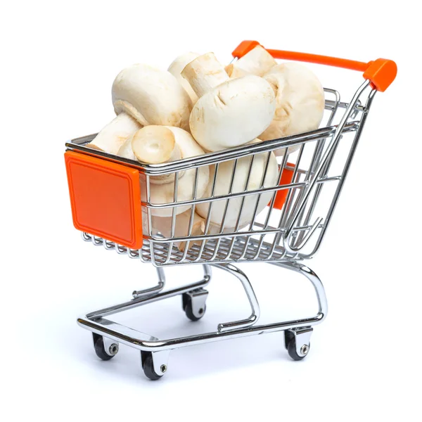 Mini carrinho de compras cheio de cogumelos — Fotografia de Stock