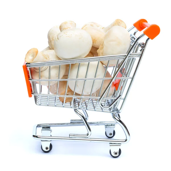 Mini carrinho de compras cheio de cogumelos — Fotografia de Stock