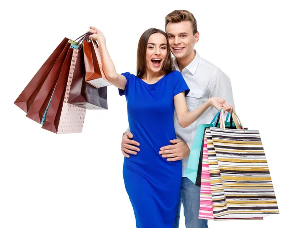 Par med shoppingväskor — Stockfoto