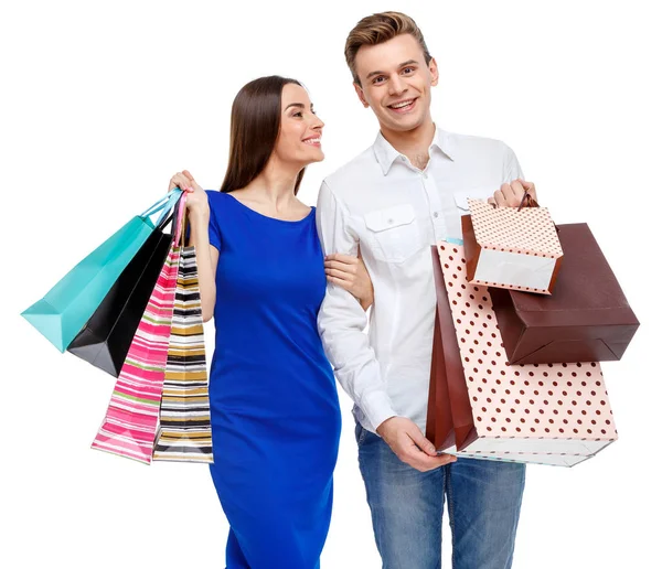 Pareja con bolsas de compras — Foto de Stock