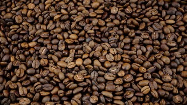 Pražená kávová zrna pozadí — Stock video