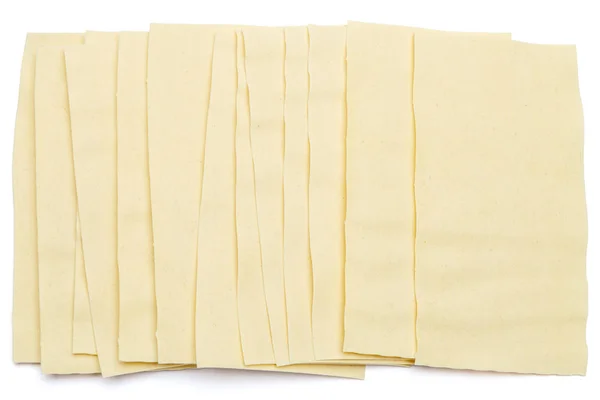 Hojas secas de pasta de lasaña sin cocer —  Fotos de Stock