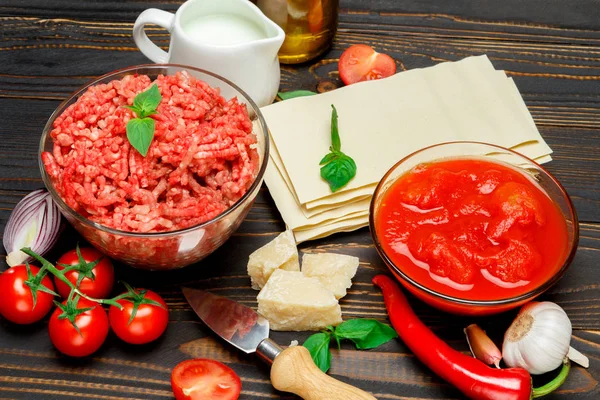 Lasagna ingridients on wooden table — Stock Photo, Image