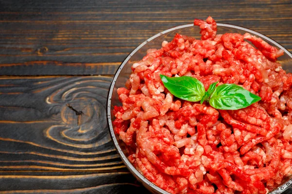 Minced meat of stuffing in glass bowl — Stock Photo, Image