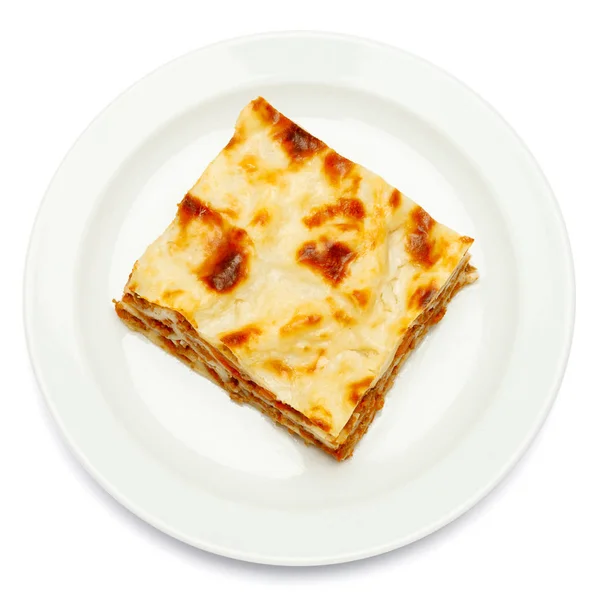 Portion leckere Lasagne isoliert auf weiß — Stockfoto