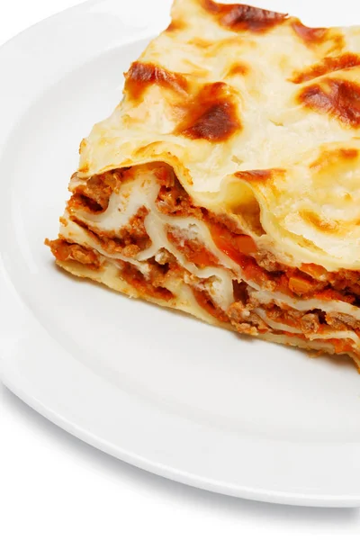 Portion of tasty lasagna isolated on white — Stock Photo, Image