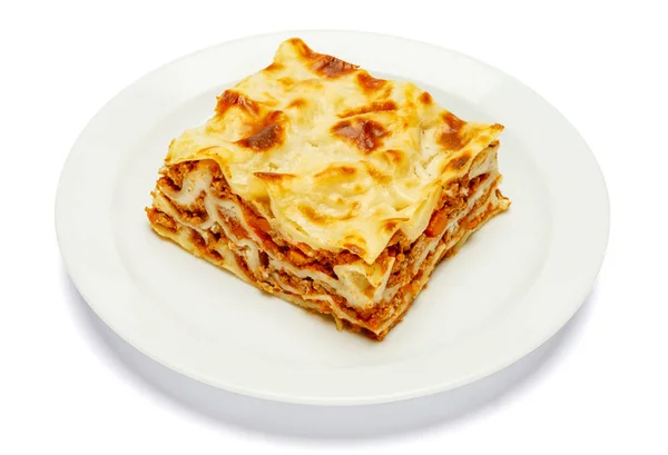 Portion de lasagnes savoureuses isolées sur blanc Images De Stock Libres De Droits