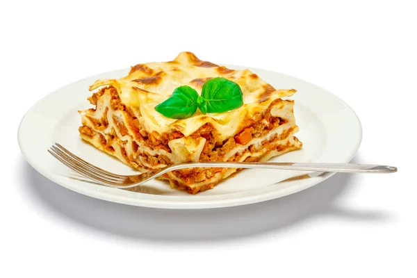 Ízletes lasagna elszigetelt fehér része — Stock Fotó