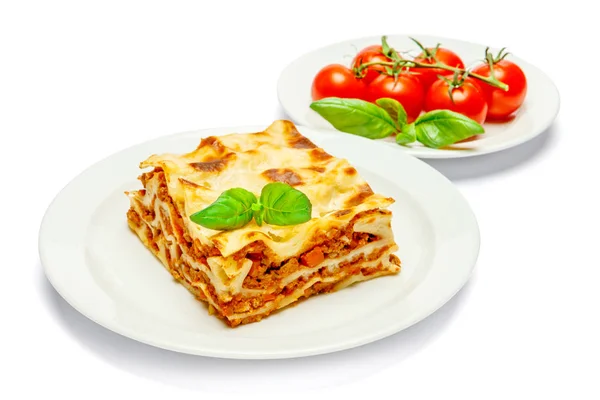 Portion of tasty lasagna isolated on white — Stock Photo, Image