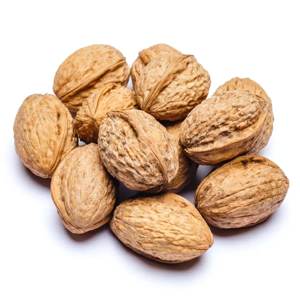 Pile of walnuts isolated on white background — Stock Photo, Image