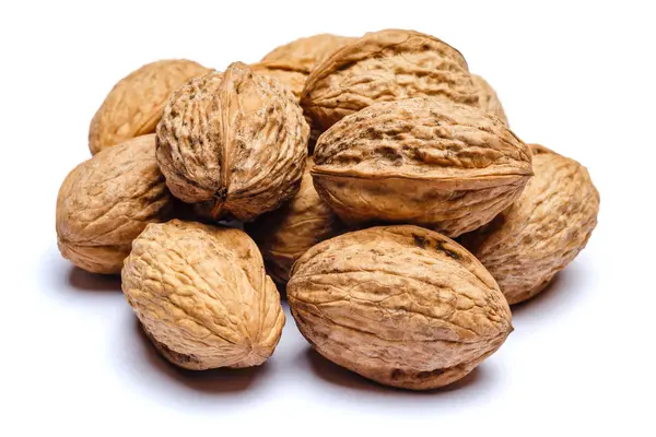 Pile of walnuts isolated on white background — Stock Photo, Image