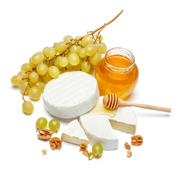 Круглый бри или камамбер сыр и мед варенье на белом фоне — стоковое фото